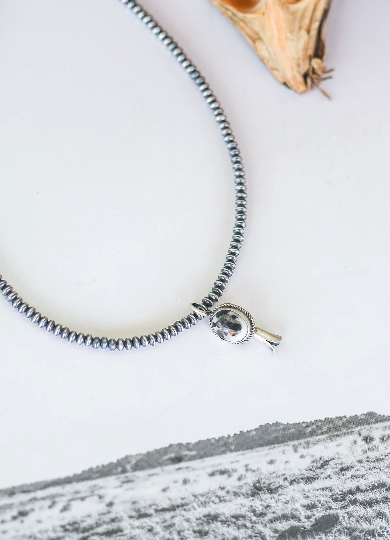White Buffalo Blossom Pendant