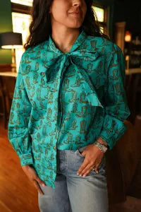 Boots And Turquoise Top